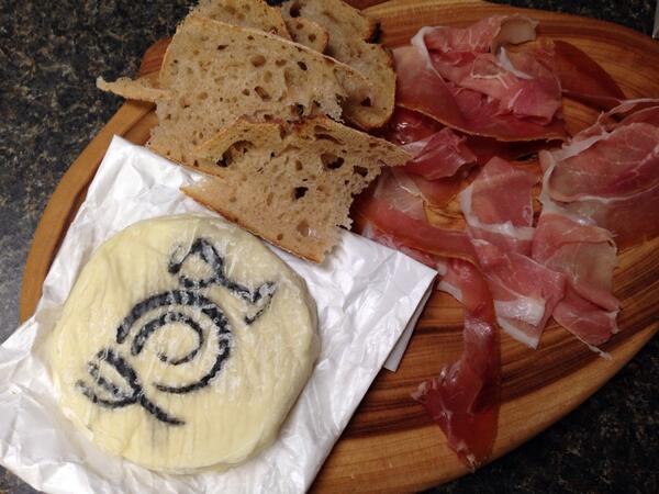 And this is why <a href="/Wegmans/">Wegmans Food Markets</a> is awesome. Stinky, creamy, logo-stamped cheese, aging in a fancy case, w <a href="/WideAwakeBakery/">Wide Awake Bakery</a>