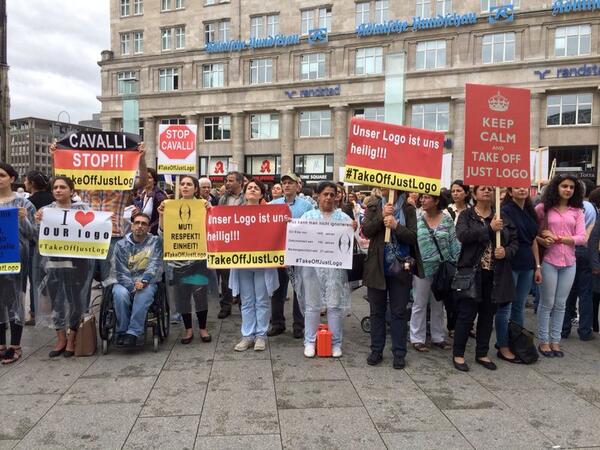 Gaandom's tweet photo. NOW 2nd rall in Germany, Köln. #TakeOffJustLogo  against #Roberto Cavalli  coping our logo
@WDR http://t.co/qzuwygZCw7