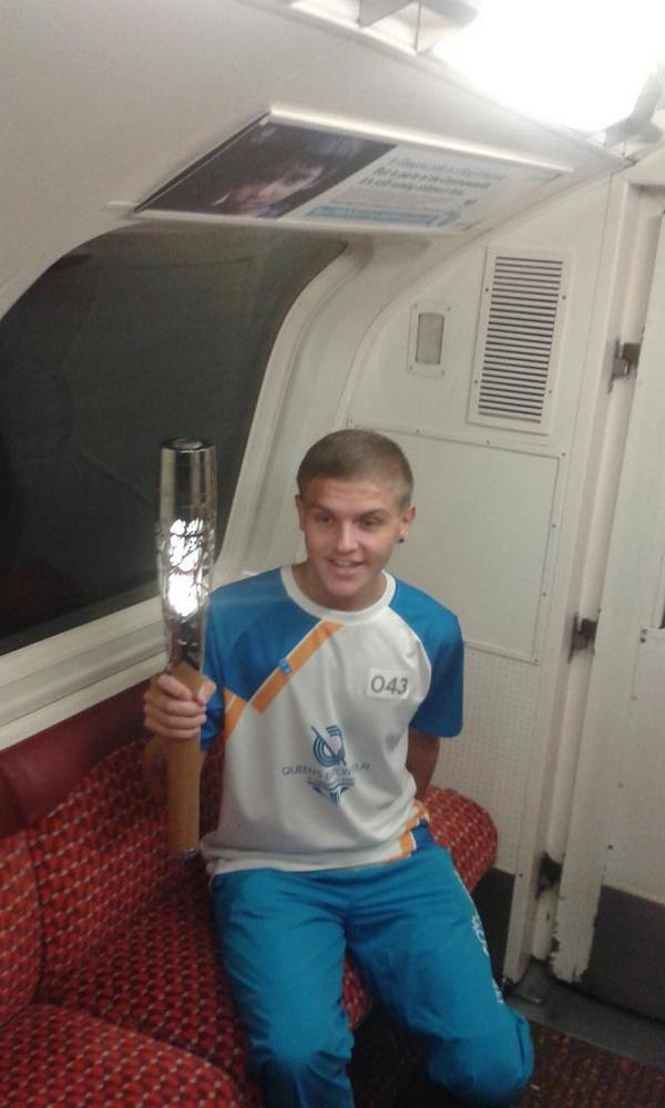 Batonrelay2014's tweet photo. Ticket to ride: The baton on a @GlasgowSubway emerging onto Buchanan Street #BatonRelay #Glasgow2014 http://t.co/L5a5VWkI8E