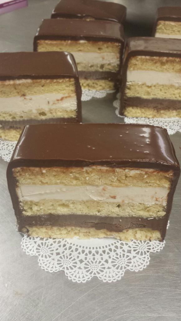 muscoreils's tweet photo. Fresh slices of our opera cake #coffee #hazelnut #italianbuttercream #ganache http://t.co/p2zk5gBtfU