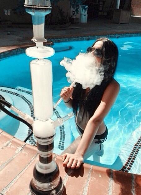 Gorgeous Girl smoking the Spyro Hookah on a Hot Summer Day☀️