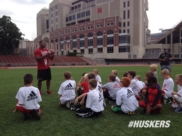 petenajarian's tweet photo. The pic get the juices flowin, with the Stadium in back there RT .@Huskers: Big dogs in the house today #Huskers camp http://t.co/pNdMh91STP