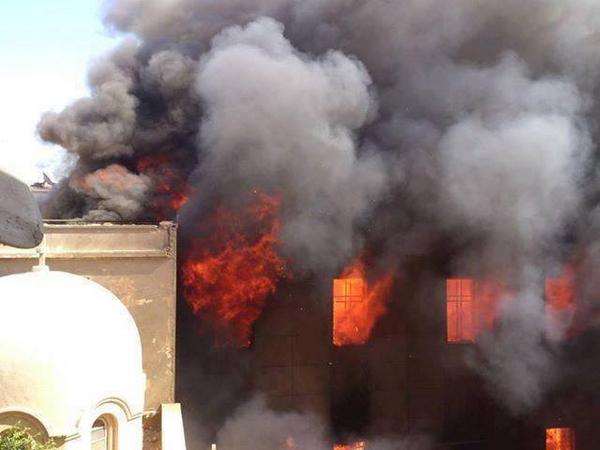 'ISIL burned down the Syriac Catholic Archdiocese of Mosul, Iraq, few hours ago' (c) Rabea Allos, Twitter, 19th July 2014
