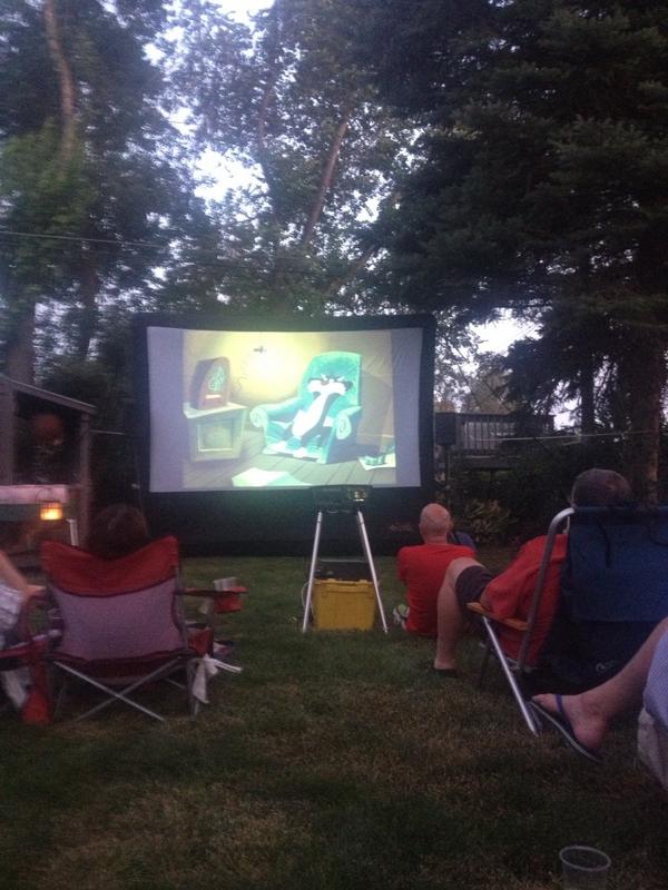 Outdoor movie night at the neighbor's. #SummerTraditions