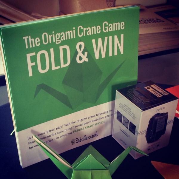SiteGround's tweet photo. In for some paper play? Fold an origami and enter our Pebble smartwatch draw #JDAYMN14 http://t.co/FBMxsC8BPS