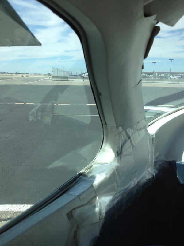 s_langlois's tweet photo. Oh sweet lord theres duck tape holding this plane together!! http://t.co/XvHQxYAjo1