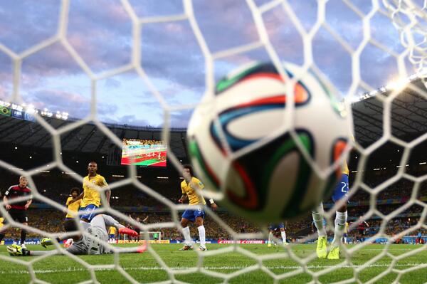 WSJphotos's tweet photo. Germany scores the 2nd of a 5-goal run over Brazil (Getty). Live #WorldCup updates from @WSJ : http://t.co/Bq9pENQhf0 http://t.co/1I9FmBk8Ka