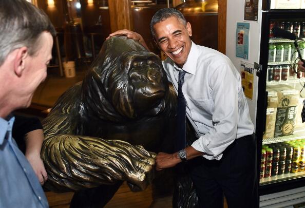 Obama fist bumps gorilla statue