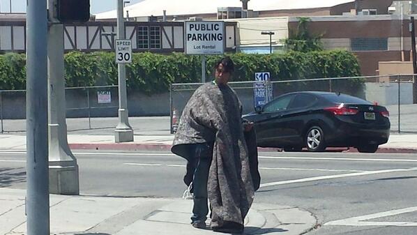 26Smash's tweet photo. Only on Hollywood do you see this weird stuff. Its at least 100 degrees and this joker is in a, wool poncho - lmao!!! http://t.co/5YNvSEGTxv