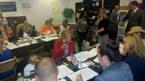 VCScribe's tweet image. @VCScribe: @BGTX @BGTX_EATX My awesome daughter, Emma, 'womaning' phones with @WendyDavisTexas in Houston this AM!!!