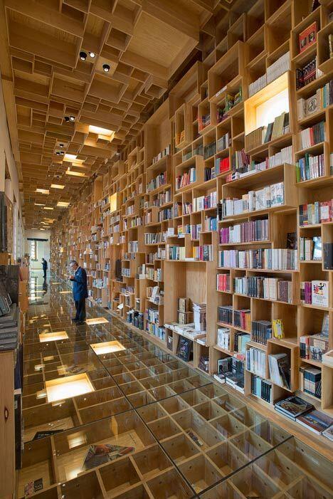 A bookshop in a #library building in Mexico City. Love the ceiling &amp; floor bookshelves ebks.to/1iTYCvN