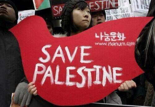 filistingrubu's tweet photo. Kore'de düzenlenen Gazze'ye destek gösterisi. http://t.co/FEZwb0mv1X