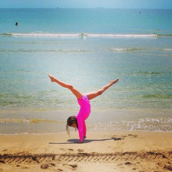 Hannah's beach handstand. #gymnast #beach #gymnasticsonthebeach