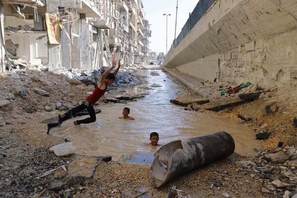 Kids In Syria Are Swimming In Pools Made By Bomb Craters