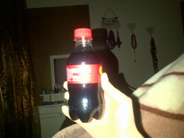 Directionette28's tweet image. Enjoying my little bottle of coke :P
