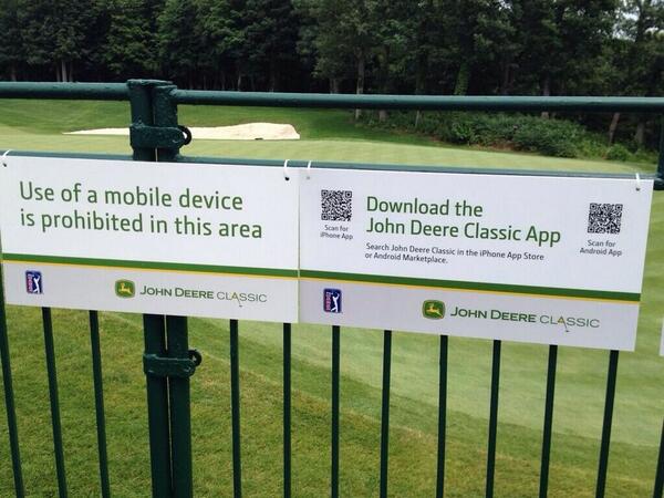 darrenrovell's tweet photo. Did someone at the John Deere Classic really put these two signs together? http://t.co/SoLk4wDkxt (via @pgapro1)