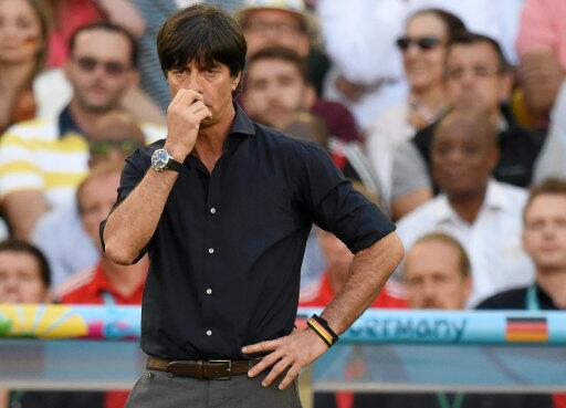 itvfootball's tweet image. Joachim Low looks for the answers up his nose #GERARG