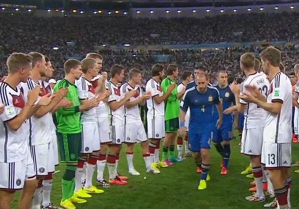 ESPNFC's tweet image. Germany making a tunnel and applauding Argentina as they go to receive their runner-up medals