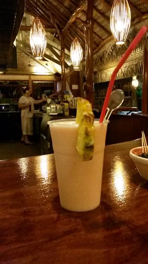 StrayAround's tweet photo. Taste testing the royal tahiti cocktail on Moorea island http://t.co/zFloDikIQ7