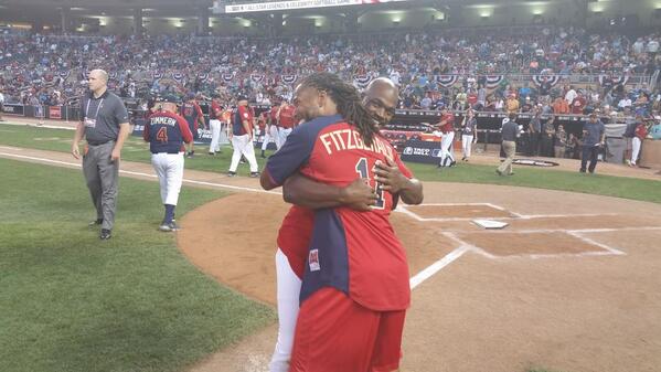 MLB's tweet photo. .@LarryFitzgerald and @AdrianPeterson tried a new sport for the day. #CelebSoftball http://t.co/XC0SyVBrME