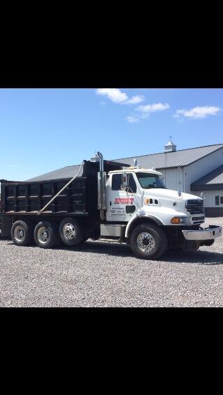 TrackTechInc's tweet image. Here is a picture of our Sterling High Rail dump truck with our Calvert City headquarters in the background.