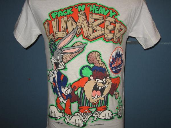 JoePantorno's tweet photo. There needs to be a mass recreation of some of these '90s sports tee's. Some of these shirts are choice. #90sMade http://t.co/31wNUULVQD