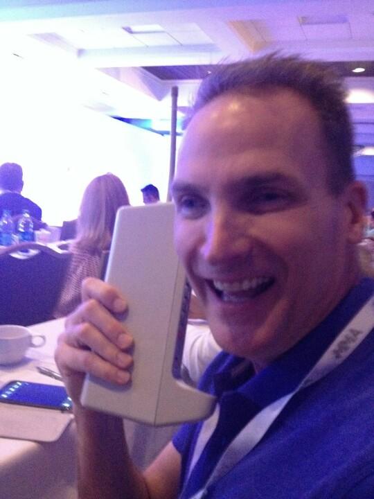 ChuckMoxley's tweet photo. I'm "talking" on first mobile phone from 1972. Weighs couple of lbs and 20 min battery life! #ceocmo with @Tim_jenks http://t.co/h6PjGNJYkm