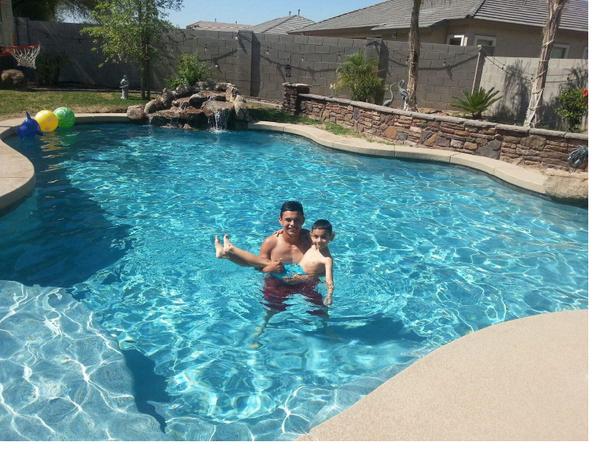 DolphinPoolsAZ's tweet photo. Here's a photo a Dolphin Pool Customer shared of her son &amp; grandson chilling in the pool #familyfun #SwimmingPoolDay http://t.co/F1coBMFqe4