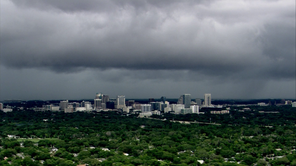 WESH's tweet image. Storm clouds over downtown #wesh2storms: