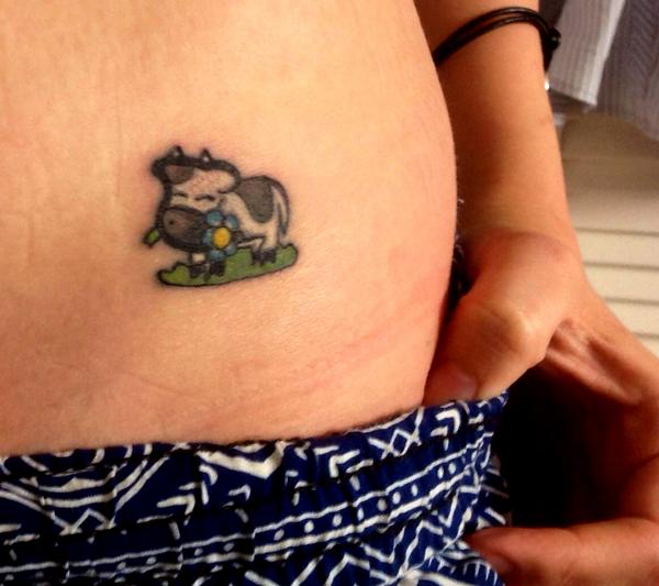 GrindheadGames's tweet photo. My girlfriend had the Cow from Cowlorful tattooed onto her for our anniversary. Speechless. Thanks @ArtJimp ! http://t.co/w0VR9iH963