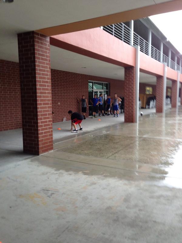 NatureCoastFB's tweet image. Rain can't stop our shine! #BackYardBall #AlwaysGettingBetter #SharkNation #WhatRain
