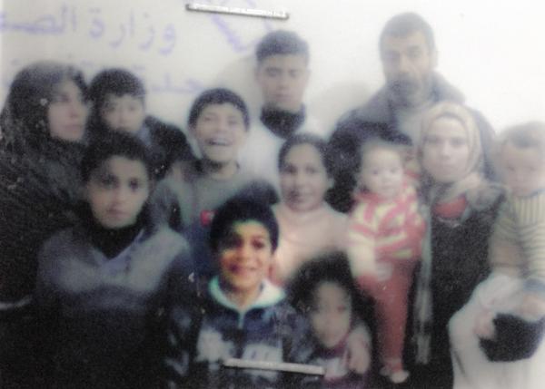 Photo: Ismail Mohammed #Bakr (10 years old) with his family, before being killed on a beach in broad daylight.