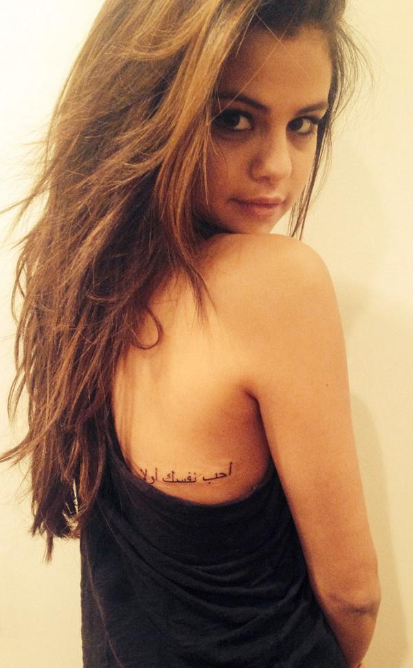 EOnlineUK's tweet photo. Fresh ink for @selenagomez. Find out the important message in her new tattoo here... http://t.co/KnvPoEeUJC #tattoo http://t.co/AqmbnsnSFP
