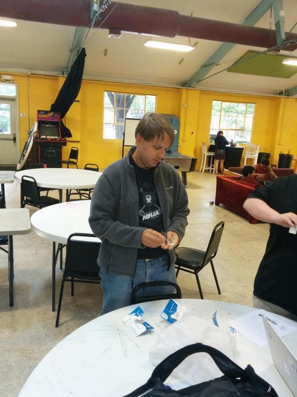 CoderDojoKSQ's tweet image. #CoderDojo sensei, Bert, opening a flash drive for our second session. #bertwatching @devalbo