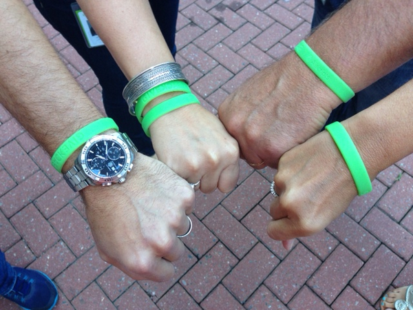 FoodBankCENC's tweet photo. We love these #AllscriptsGiveBack bands! Very cool, @Allscripts. http://t.co/f88elrs1iB