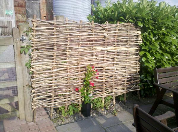 A happy customer with their new hurdle wind break! Order now for hazel being cut in October. Coppicecrafts.blogspot.com