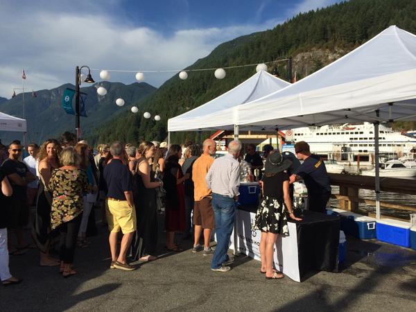 TrollerAleHouse's tweet photo. The crew is working hard. A perfect evening! Congrats to @RCMSAR_01 #dinneronthedock #horseshoebay http://t.co/9lXXO4Hom4