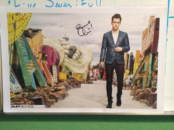 AltPress's tweet photo. It's #APFastFri! Answer the Q in the next tweet to win this dreamy poster signed by @brendonurie of @PanicAtTheDisco! http://t.co/LII2I10QTx