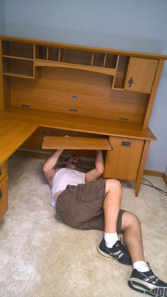 My husband Mr. Wick setting up my desk!! Tweet me pics of your virtual workspace! #virtualschoolrocks