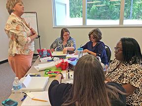 ArkansasEd's tweet photo. Denise Merritt, SAU STEM Center math specialist, provided MDC training at the South Central Coop. #ARMDC http://t.co/gcIhNHfSzt