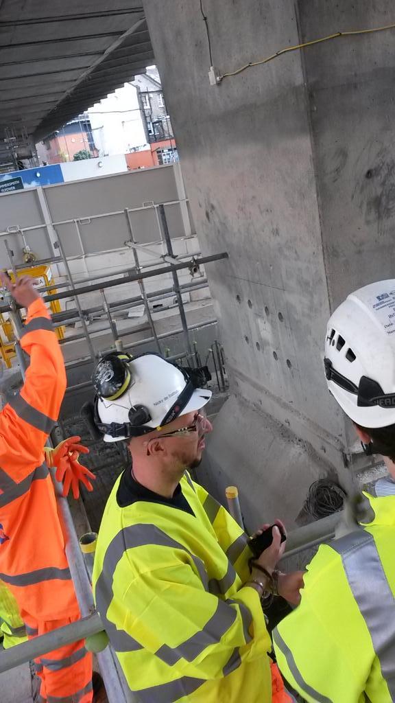 aboldguess's tweet photo. The deployment team admiring the bearings beneath the Hammersmith flyover http://t.co/ptMdYq55GI