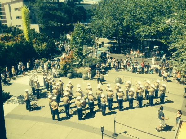 space_needle's tweet image. Third Marine Aircraft Wing Band playing at the base of the Needle #seafair