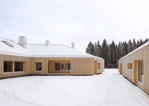dezeen's tweet image. House in Finland designed to shelter a courtyard from wintery gusts: dezeen.com/2014/08/01/hou… #architecture