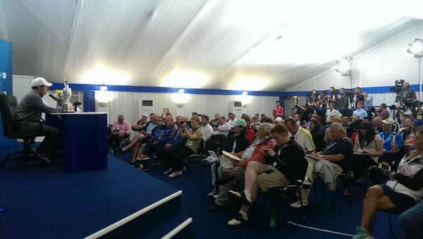 TheOpen's tweet image. Rory (and the Claret Jug) inside a packed media centre at #TheOpen.