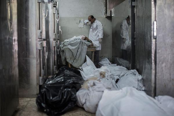 Nedakharoub's tweet photo. "@IsraelWC1: Death toll in Gaza reach 450, among them 113 child, 40 woman #GazaUnderAttack http://t.co/kdA8yaUhPr"