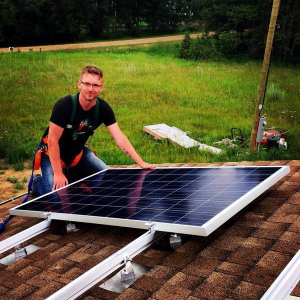 MikeHudema's tweet photo. #Solar panels going up! #solarcourse day 5. http://t.co/ntklRpSUzo #yeg http://t.co/aC9LiTbTnh