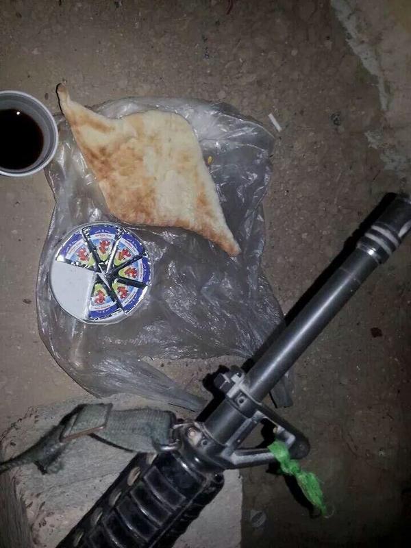 IraqiSecurity's tweet photo. Suhoor on the frontline in #Iraq. http://t.co/ApCag2u7Rm
