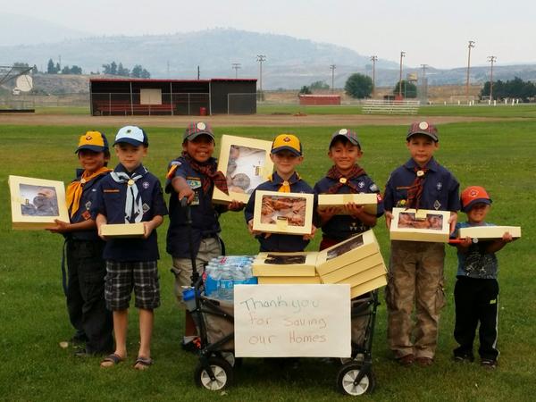 KREM2Laura's tweet photo. Even in bad times - good shines. Scouts giving donuts to firefighters #CarltonComplex #HELP2WA @krem2 http://t.co/SPrbmKn6Af