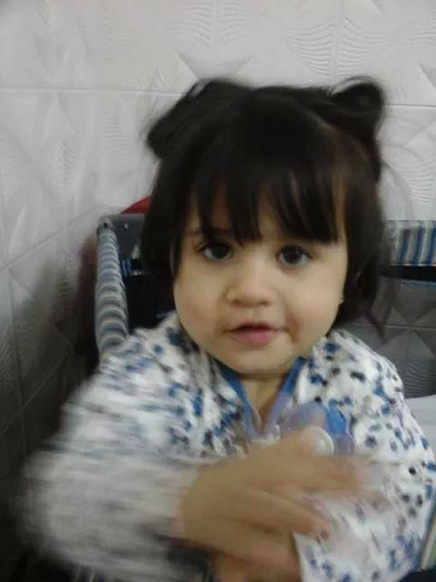 Mi nietita, le cortaron el.flequillo y parace una bebe mas grande!!!!! Jejejej