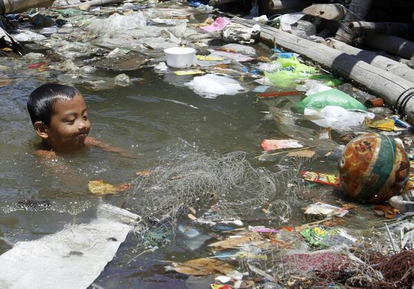 scienceride's tweet photo. Kid taking a swim in the river. http://t.co/8LcjPOtdfL